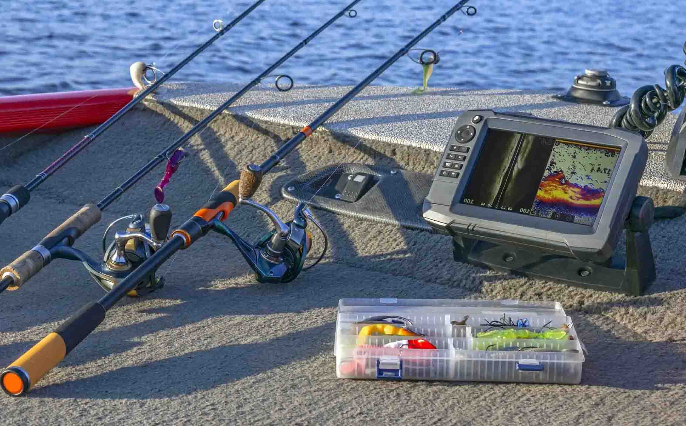 Spinning fishing rods with reels, lures, and a fish finder.